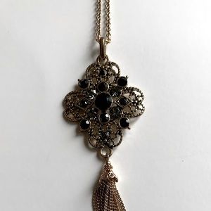 Accessorize brand- Long pendant necklace with black and gray zircon stones.